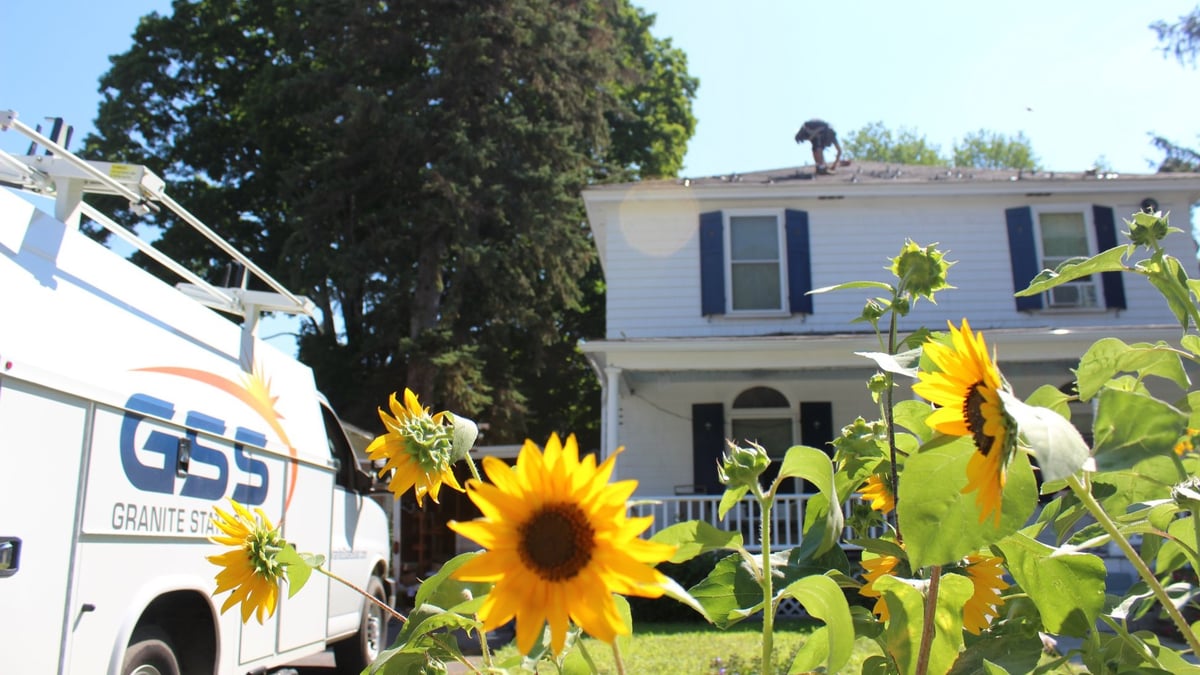 Sunflowers and the Granite State Solar Work Truck